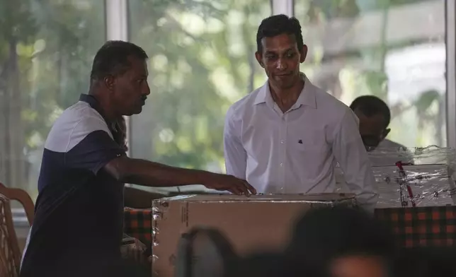 A Sri Lankan man casts his vote at a polling station during presidential elections in Colombo, Sri Lanka, Saturday, Sept. 21, 2024. (AP Photo/Rajesh Kumar Singh)