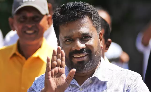 Leader and the presidential candidate of National People's Power Anura Kumara Dissanayake arrives at a polling station to cast his vote in Colombo, Sri Lanka, Saturday, Sept. 21, 2024. (AP Photo/Eranga Jayawardena)