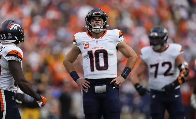 Denver Broncos quarterback Bo Nix (10) reacts during the second half of an NFL football game against the Pittsburgh Steelers, Sunday, Sept. 15, 2024, in Denver. (AP Photo/Jack Dempsey)