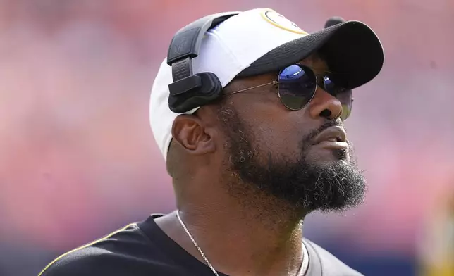 Pittsburgh Steelers head coach Mike Tomlin watches during the second half of an NFL football game against the Denver Broncos, Sunday, Sept. 15, 2024, in Denver. (AP Photo/David Zalubowski)