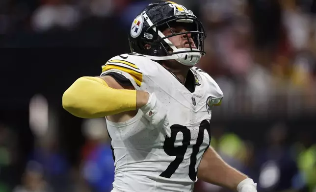 Pittsburgh Steelers linebacker T.J. Watt (90) reacts after knocking the ball from Atlanta Falcons quarterback Kirk Cousins as he looked to pass during the second half of an NFL football game Sunday, Sept. 8, 2024, in Atlanta. (AP Photo/Butch Dill)