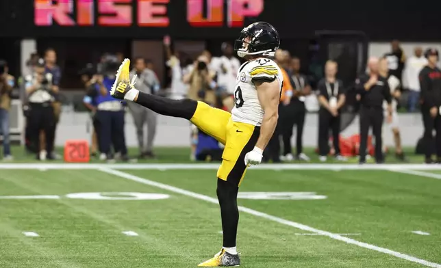 Pittsburgh Steelers linebacker T.J. Watt celebrates after sacking Atlanta Falcons quarterback Kirk Cousins at the end of an NFL football game Sunday, Sept. 8, 2024, in Atlanta. (AP Photo/Butch Dill)