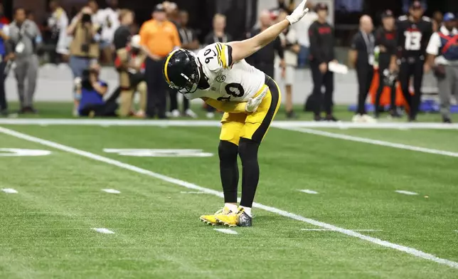 Pittsburgh Steelers linebacker T.J. Watt celebrates after sacking Atlanta Falcons quarterback Kirk Cousins at the end of an NFL football game Sunday, Sept. 8, 2024, in Atlanta. (AP Photo/Butch Dill)