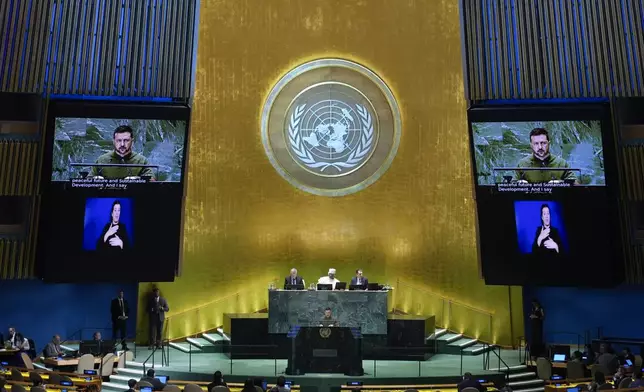 Ukraine's President Volodymyr Zelenskyy addresses the the Summit of the Future at United Nations headquarters, Monday, Sept. 23, 2024. (AP Photo/Seth Wenig)