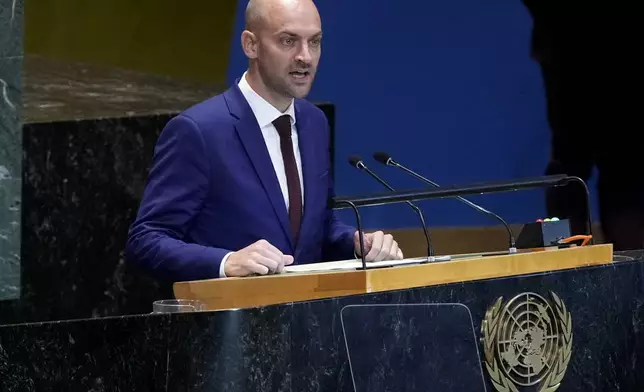 France's Foreign Minister Jean-Noel Barrot addresses the Summit of the Future, in the United Nations General Assembly, Monday, Sept. 23, 2024. (AP Photo/Richard Drew)