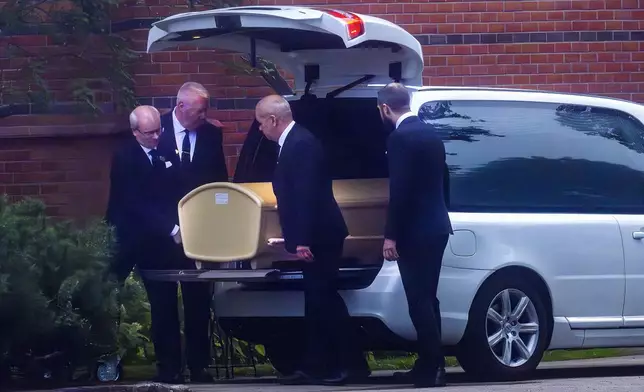 A coffin of football legend Sven-Goran Eriksson is carried into Fryksande church in Torsby, Sweden, Friday, Sept. 13, 2024. (Jonas Ekströmer/TT News Agency via AP)