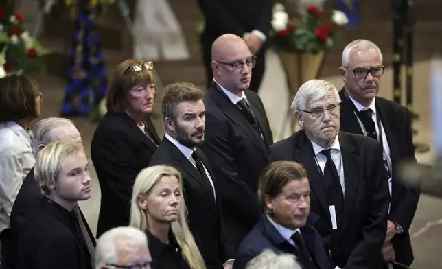 David Beckham leaves the church after the funeral service of Swedish soccer manager Sven-Goran Eriksson at Fryksände church in Torsby, Sweden, Friday Sept. 13, 2024. (Adam Ihse/TT News Agency via AP)