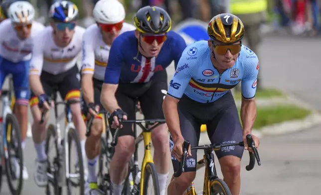 Belgium's Remco Evenepoel attacks during the Men Elite road race of the Cycling and Para-cycling Road World Championships in Zurich, Switzerland, Sunday, Sept. 29, 2024. (Zac Williams/SWpix.com/Pool Photo via AP)