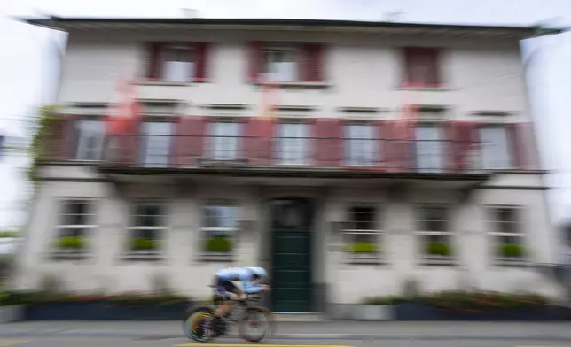 Jasper Schoofs of Belgium rides to take the silver medal during the Junior Men individual time trial over 24.9 kilometres (15.5 miles) at the Cycling World Championships in Zurich, Switzerland, Monday, Sept. 23, 2024. (AP Photo/Peter Dejong)