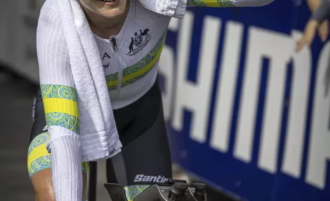 Grace Brown of Australia reacts after winning the women elite individual time trial over 29.9 kilometers (18.6 miles) at the Cycling World Championships in Zurich, Switzerland, Sunday, Sept. 22, 2024. (Michael Buholzer/Keystone via AP)