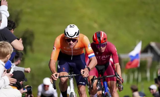 Netherlands' Mathieu van der Poel rides during the Men Elite road race of the Cycling and Para-cycling Road World Championships in Zurich, Switzerland, Sunday, Sept. 29, 2024. (Zac Williams/SWpix.com/Pool Photo via AP)