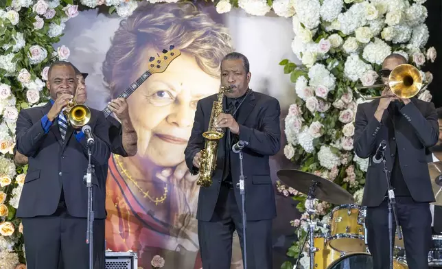 Donald Harrison, Troy Andrews, Andrew Baham, Darrell Lavigne, Chris Severin and Herman LeBeaux play music in honor of Sybil Haydel Morial at Xavier University of Louisiana during a Celebration of Life, Monday, Sept. 23, 2024, in New Orleans. (Chris Granger/The Times-Picayune/The New Orleans Advocate via AP)