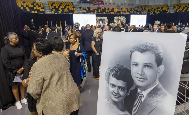 A photo of former New Orleans Mayor Ernest "Dutch" and his wife, Sybil Haydel Morial, greets family and guests at Xavier University of Louisiana for a Celebration of Life for Morial, Monday, Sept. 23, 2024, in New Orleans. (Chris Granger/The Times-Picayune/The New Orleans Advocate via AP)