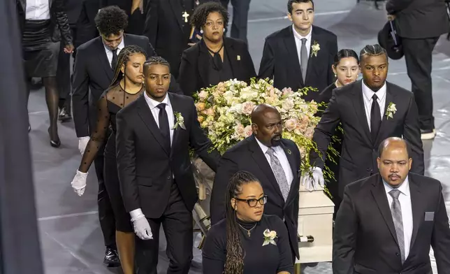 The grandchildren of Sybil Haydel Morial carry out her casket during a Celebration of Life for Morial at Xavier University of Louisiana, Monday, Sept. 23, 2024, in New Orleans. (Chris Granger/The Times-Picayune/The New Orleans Advocate via AP)