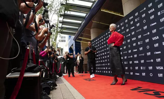 Jamie Lee Curtis stands on the red carpet for the premiere of "The Last Showgirl" at the Princess of Wales Theatre, during the Toronto International Film Festival, in Toronto, Friday Sept. 6, 2024. (Paige Taylor White/The Canadian Press via AP)