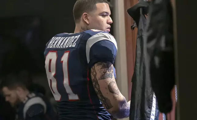 This image released by FX shows Josh Rivera as Aaron Hernandez in a scene from the FX series "American Sports Story: Aaron Hernandez." (FX via AP)