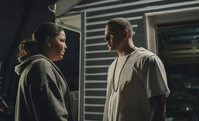 This image released by FX shows Lindsay Mendez as Tanya Singleton, left, and Josh Rivera as Aaron Hernandez in a scene from the FX series "American Sports Story: Aaron Hernandez." (FX via AP)