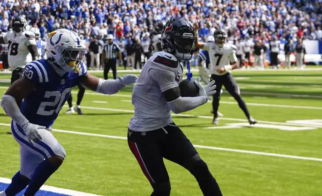 Houston Texans wide receiver Stefon Diggs (1) makes touchdown reception during the second half of an NFL football game against the Indianapolis Colts, Sunday, Sept. 8, 2024, in Indianapolis. (AP Photo/Darron Cummings)