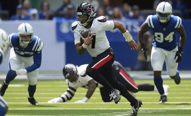 Houston Texans quarterback C.J. Stroud (7) runs during the first half of an NFL football game against the Indianapolis Colts, Sunday, Sept. 8, 2024, in Indianapolis. (AP Photo/Darron Cummings)