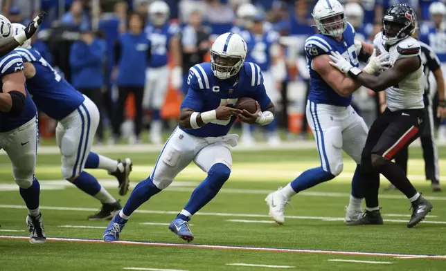 Indianapolis Colts quarterback Anthony Richardson (5) runs during the second half of an NFL football game against the Houston Texans, Sunday, Sept. 8, 2024, in Indianapolis. (AP Photo/Michael Conroy)