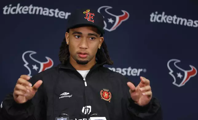 Houston Texans quarterback C.J. Stroud speaks during a news conference after an NFL football game against the Minnesota Vikings, Sunday, Sept. 22, 2024, in Minneapolis. The Vikings won 34-7. (AP Photo/Bruce Kluckhohn)