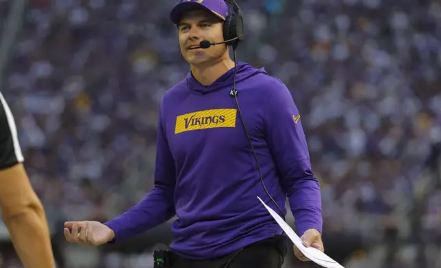 Minnesota Vikings head coach Kevin O'Connell questions a call during the first half of an NFL football game against the Houston Texans, Sunday, Sept. 22, 2024, in Minneapolis. (AP Photo/Bruce Kluckhohn)