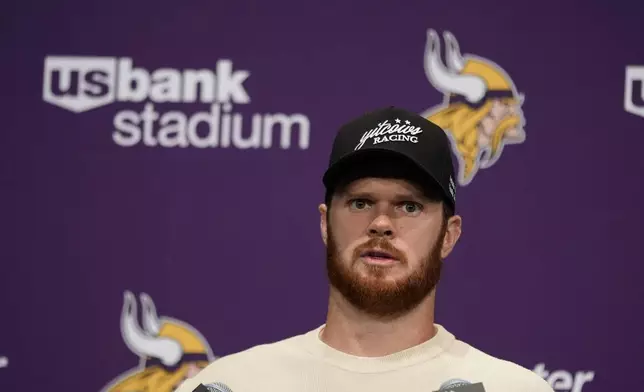 Minnesota Vikings quarterback Sam Darnold speaks during a news conference after an NFL football game against the Houston Texans, Sunday, Sept. 22, 2024, in Minneapolis. The Vikings won 34-7. (AP Photo/Abbie Parr)