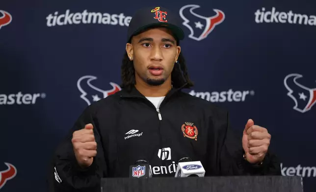 Houston Texans quarterback C.J. Stroud speaks during a news conference after an NFL football game against the Minnesota Vikings, Sunday, Sept. 22, 2024, in Minneapolis. The Vikings won 34-7. (AP Photo/Bruce Kluckhohn)