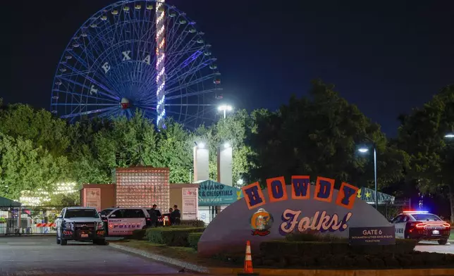 FILE - Dallas police block an entrance to the State Fair of Texas after a shooting, Oct. 14, 2023, in Dallas. (Elías Valverde II/The Dallas Morning News via AP, File)