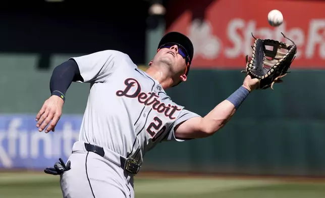 Detroit Tigers first baseman Spencer Torkelson (20) catches a pop-up hit by Oakland Athletics' Max Schuemann during the fifth inning of a baseball game in Oakland, Calif., Sunday, Sept. 8, 2024. (AP Photo/Jed Jacobsohn)