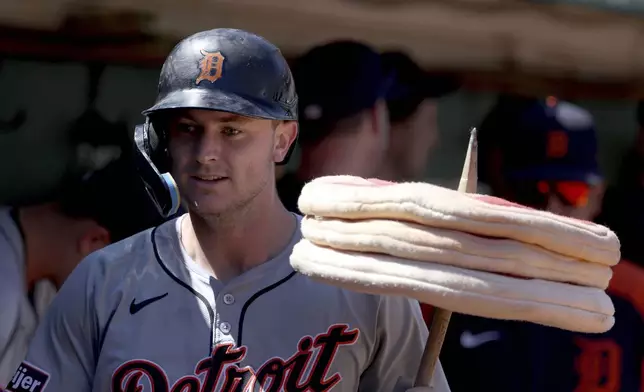 Detroit Tigers' Trey Sweeney celebrates after hitting a home run during the third inning of a baseball game against the Oakland Athletics in Oakland, Calif., Sunday, Sept. 8, 2024. (AP Photo/Jed Jacobsohn)