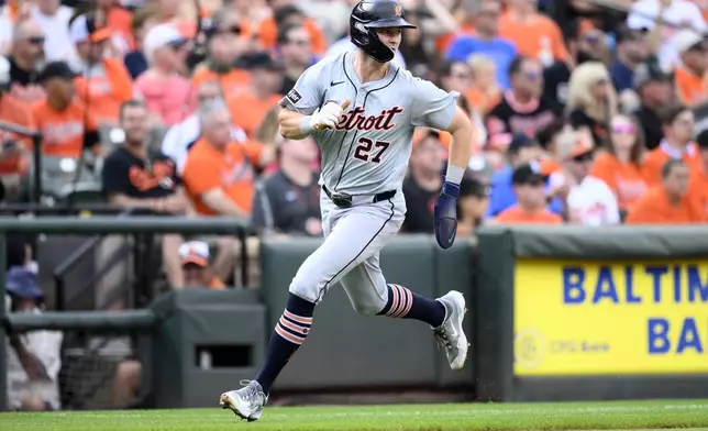 Detroit Tigers' Trey Sweeney runs towards home to score on a triple by Dillon Dingler during the second inning of a baseball game against the Baltimore Orioles, Saturday, Sept. 21, 2024, in Baltimore. (AP Photo/Nick Wass)