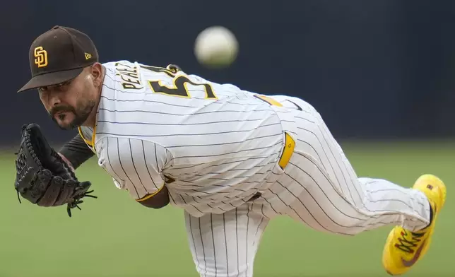 San Diego Padres starting pitcher Martin Perez works against a Detroit Tigers batter during the first inning of a baseball game Thursday, Sept. 5, 2024, in San Diego. (AP Photo/Gregory Bull)