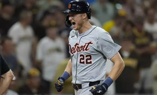 Detroit Tigers' Parker Meadows celebrates after hitting a grand slam during the ninth inning of a baseball game against the San Diego Padres, Thursday, Sept. 5, 2024, in San Diego. (AP Photo/Gregory Bull)