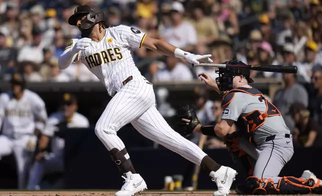 San Diego Padres' Fernando Tatis Jr. watches his groundout while batting during the first inning of a baseball game against the Detroit Tigers, Monday, Sept. 2, 2024, in San Diego. (AP Photo/Gregory Bull)