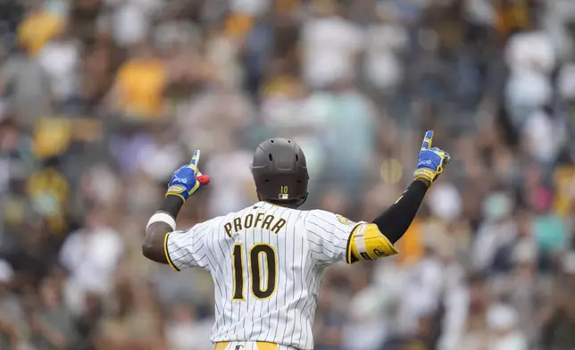 San Diego Padres' Jurickson Profar celebrates after hitting a home run during the first inning of a baseball game against the Detroit Tigers, Thursday, Sept. 5, 2024, in San Diego. (AP Photo/Gregory Bull)