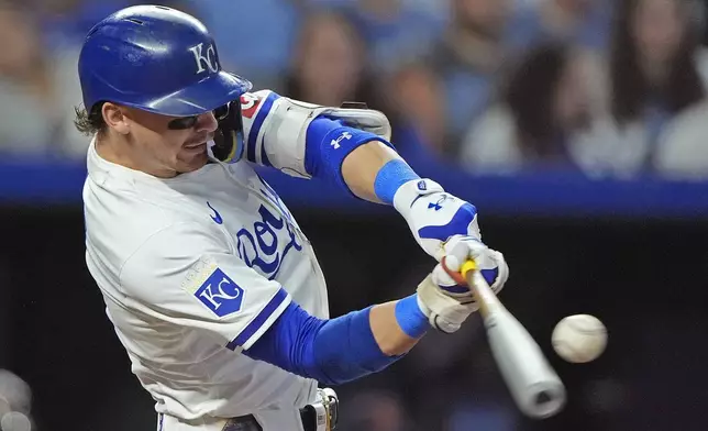 Kansas City Royals' Bobby Witt Jr. hits a grand slam during the third inning of a baseball game against the Detroit Tigers Monday, Sept. 16, 2024, in Kansas City, Mo. (AP Photo/Charlie Riedel)