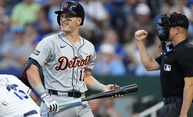 Detroit Tigers' Jace Jung reacts after striking out with the bases loaded during the first inning of a baseball game against the Kansas City Royals Wednesday, Sept. 18, 2024, in Kansas City, Mo. (AP Photo/Charlie Riedel)