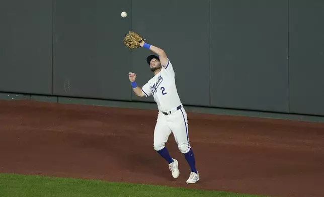 Kansas City Royals center fielder Garrett Hampson catches a fly ball for the out on Detroit Tigers' Trey Sweeney during the sixth inning of a baseball game Wednesday, Sept. 18, 2024, in Kansas City, Mo. (AP Photo/Charlie Riedel)