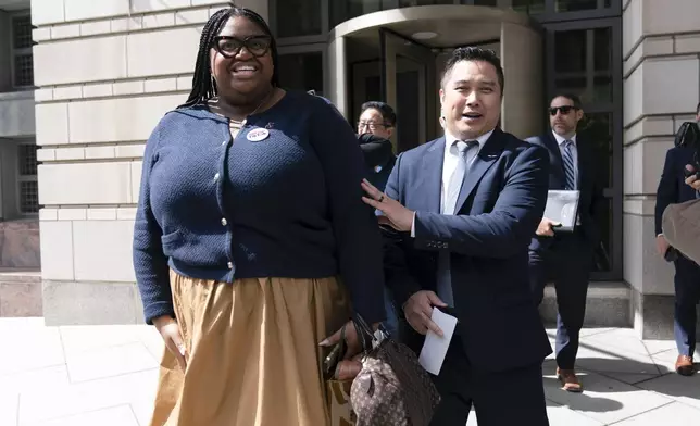 TikTok content creators Talia Cadet, left, and Paul Tran leave the federal courthouse in Washington, Monday, Sept. 16, 2024, after a hearing on TikTok's lawsuit against the federal government. (AP Photo/Jose Luis Magana)