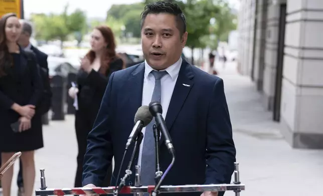 TikTok content creator Paul Tran talks to the press as he leaves the federal courthouse in Washington, Monday, Sept. 16, 2024, after a hearing on TikTok's lawsuit against the federal government. (AP Photo/Jose Luis Magana)