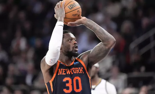 FILE - New York Knicks forward Julius Randle looks to shoot a free throw in the second half of an NBA basketball game against the Denver Nuggets, on Jan. 25, 2024, at Madison Square Garden in New York. (AP Photo/Mary Altaffer, File)