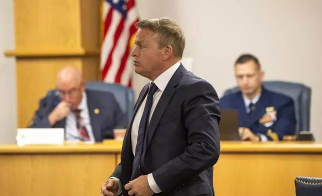 Former OceanGate's Director of Marine Operations, David Lochridge, center, stands during his testimony, Tuesday, Sept. 17, 2024, for the Titan marine board formal hearing inside the Charleston County Council Chambers, in North Charleston, S.C. (Andrew J. Whitaker/The Post And Courier via AP, Pool)