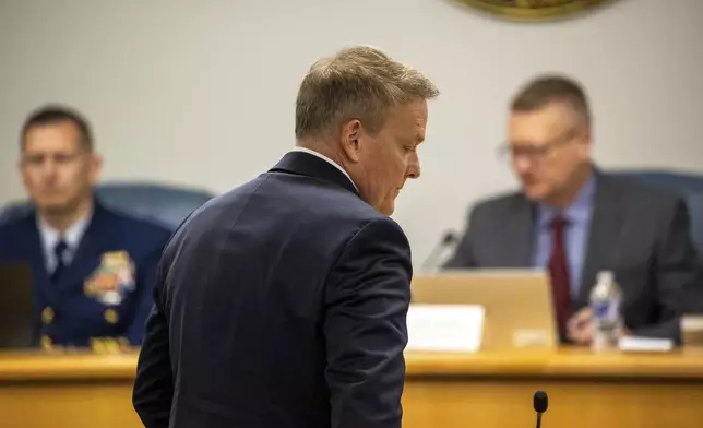 Former OceanGate's Director of Marine Operations, David Lochridge, center, testifies, Tuesday, Sept. 17, 2024, in front of the Titan marine board formal hearing inside the Charleston County Council Chambers, in North Charleston, S.C. (Andrew J. Whitaker/The Post And Courier via AP, Pool)