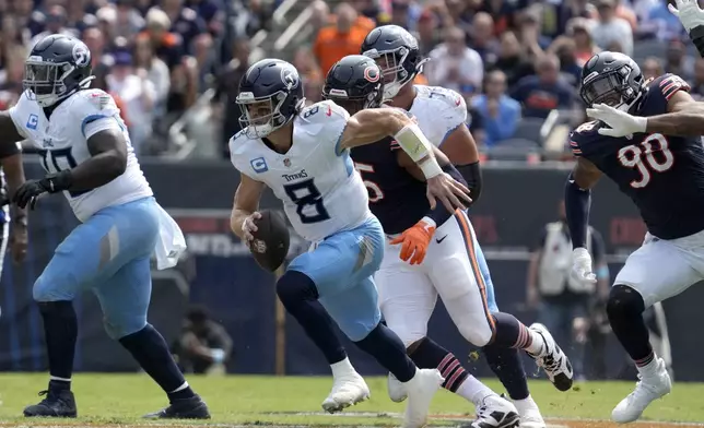 Tennessee Titans quarterback Will Levis scrambles during the first half of an NFL football game against the Chicago Bears on Sunday, Sept. 8, 2024, in Chicago. (AP Photo/Nam Y. Huh)