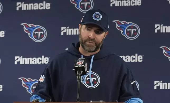 Tennessee Titans head coach Brian Callahan meets with reporters after his team's 24-17 loss to the Chicago Bears in an NFL football game Sunday, Sept. 8, 2024, in Chicago. (AP Photo/Erin Hooley)