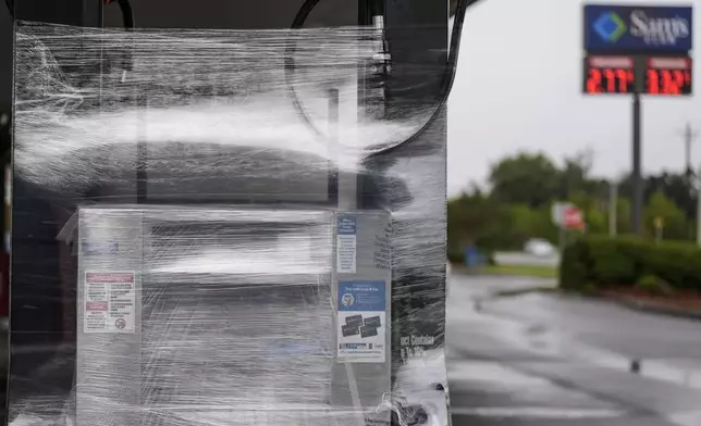 The Sam's Club fuel island is closed ahead of Hurricane Helene, expected to make landfall Thursday evening, Thursday, Sept. 26, 2024, in Valdosta, Ga. (AP Photo/Mike Stewart)