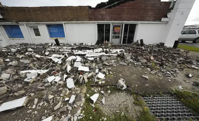 A building is damaged in the aftermath of Hurricane Francine in Morgan City, La., Thursday, Sept. 12, 2024. (AP Photo/Gerald Herbert)