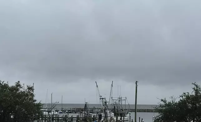 Boats leaving Pass Christian Harbor after mandatory evacuation issued Tuesday, Sept. 10, 2024 in Pass Christian, Miss., due to Tropical Storm Francine. (Hunter Dawkins/The Gazebo Gazette via AP)