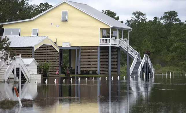 Flooding along Whitney Street in the Shoreline Park neighborhood in Hancock County, Miss., after Hurricane Francine on Thursday, Sept. 12, 2024. (Hannah Ruhoff/The Sun Herald via AP)